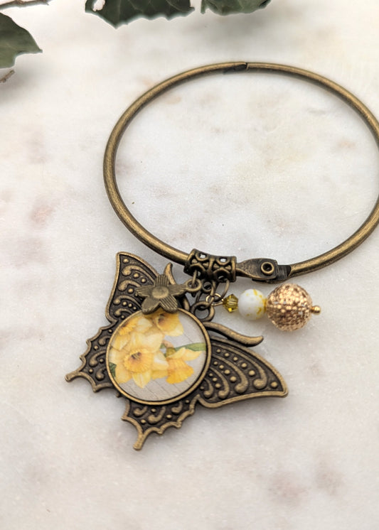 Garde-fils de broderie Narcisse